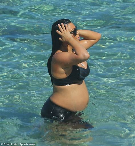 Kim Kardashian Bares Baby Bump As Khloe And Kourtney Take A Fully