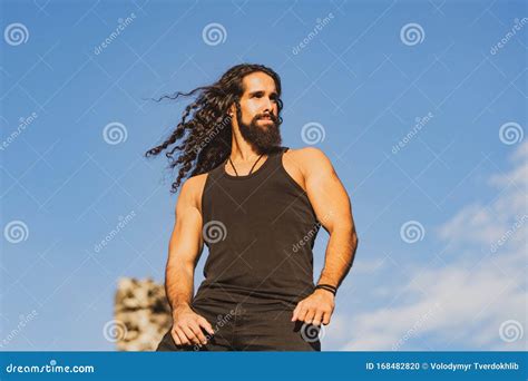 Handsome Bearded Man With Long Dark Hair Fashionable Man With Long