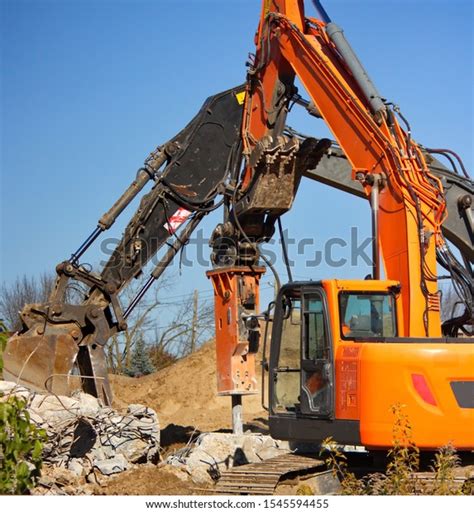 Two Backhoes On Construction Site Different Stock Photo 1545594455