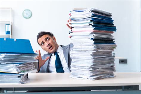 Businessman With Heavy Paperwork Workload Stock Photo Image Of Paper