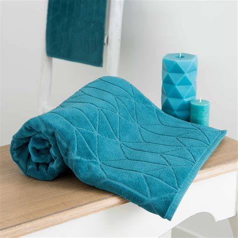 Alliant élégance et confort, les serviettes. Serviette de toilette en coton bleu pétrole à motifs 30x50 ...