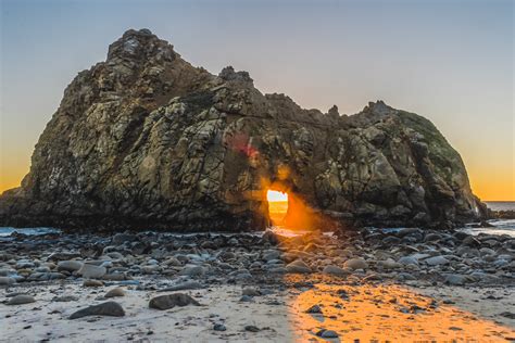 Sunlight Shining Through The Keyhole Rock In Big Sur California Oc