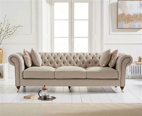 The Camara Chesterfield Beige Linen 3 Seater Sofa Features A Classic
