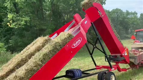 Bailing Hay With 10 Bale Kuhns Accumulator Youtube