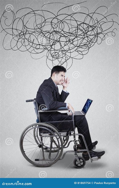 Businessman Looks Dizzy With Laptop And Scribbles Stock Photo Image