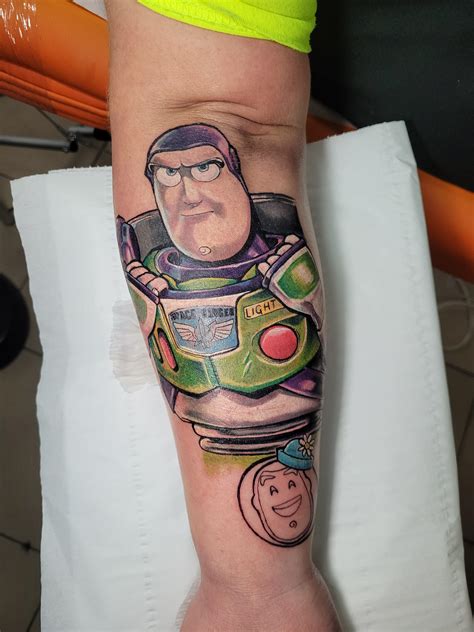 to infinity and beyond tattoo by martin parker r disney