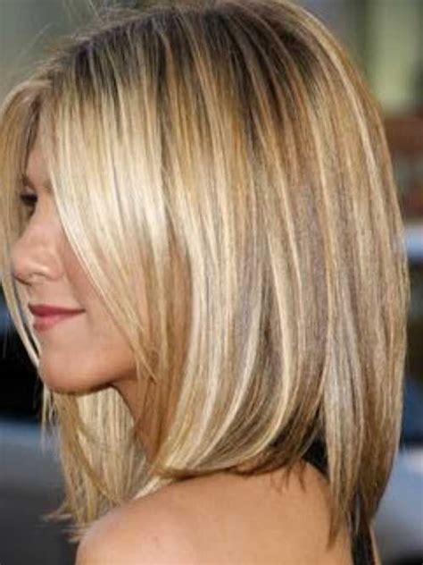 Dark brown hair styled in a folded, messy bun at back and graced by blonde highlights all over for an attractive hairstyle. Short Brown Hair With Blonde Highlights | The Best Short ...