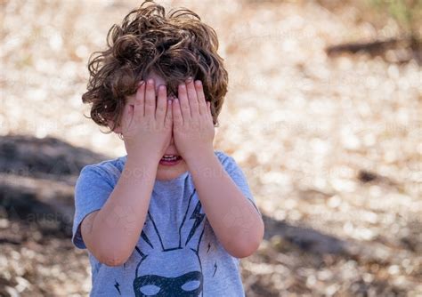 Image Of Toddler Plays Hide And Seek Game Austockphoto