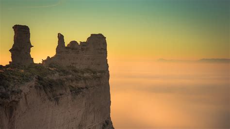 4k Rock Cliff Fog Wallpaper 3840x2160