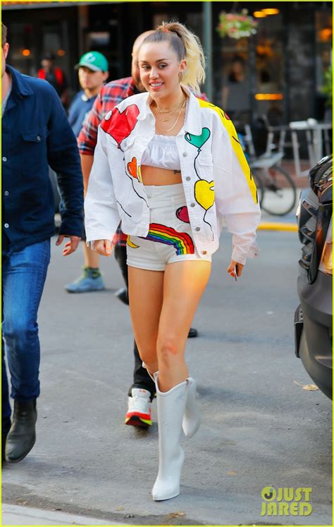 Miley Cyrus Shows Off Her Legs In Rainbow Short Shorts Photo