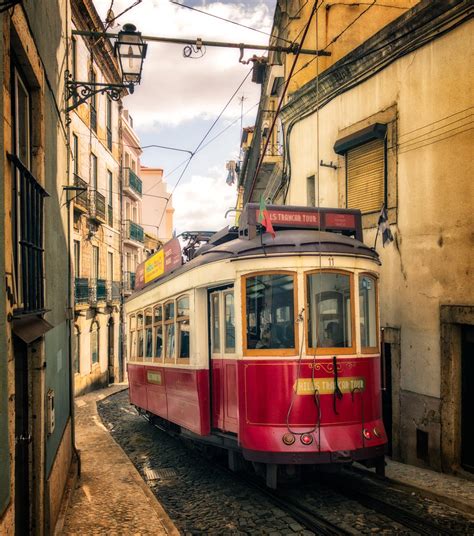 Tram In Alfama Lisbon Portugal Fine Art Photography By Nico Trinkhaus