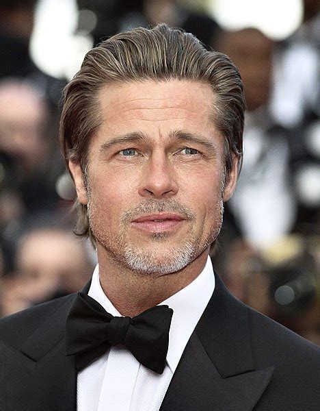 Brad Pitt Draws Attention After Debuting New Shorter Haircut At Golden