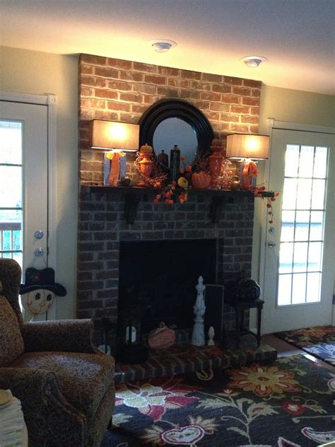 My Mantel With Lamps On Outlet Is In Wall Of Fireplace Behind Mirror