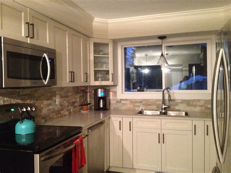 Maybe you would like to learn more about one of these? Cream Colored Kitchen Cabinets With Black Stainless Steel ...