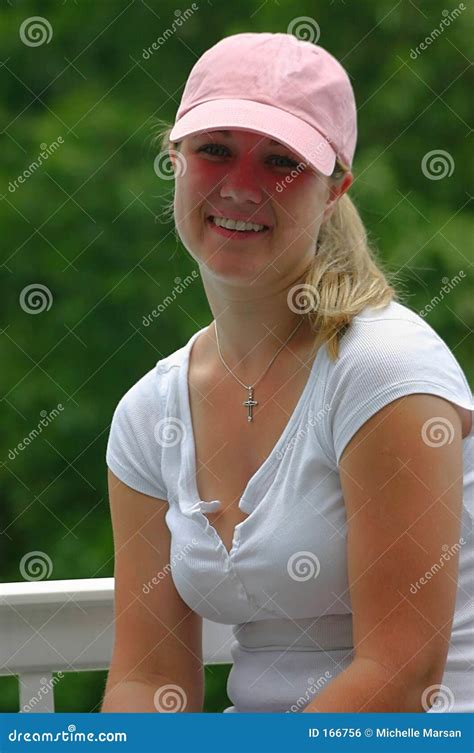 Young Woman Wearing A Pink Baseball Hat Stock Photo Image Of Teeth