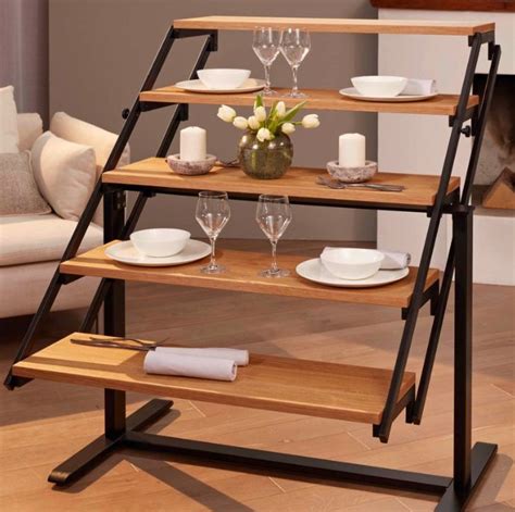 A low table, typically placed in front of a sofa. This Amazing Shelf Transforms Into A Dining Table And It's ...