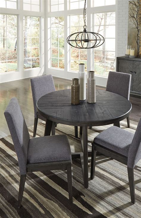 That's why we offer these unique jupe dining tables that seat four comfortably, but can expand to offer more seating for entertaining more guests. Besteneer Dark Gray 6 Pc Round Dining Room Table, 4 Upholstered Side Chairs & Server | Mathis ...