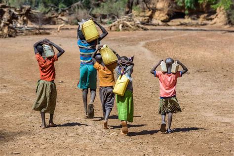 Carrying Water Can Be A Pain In The Neck World Vision