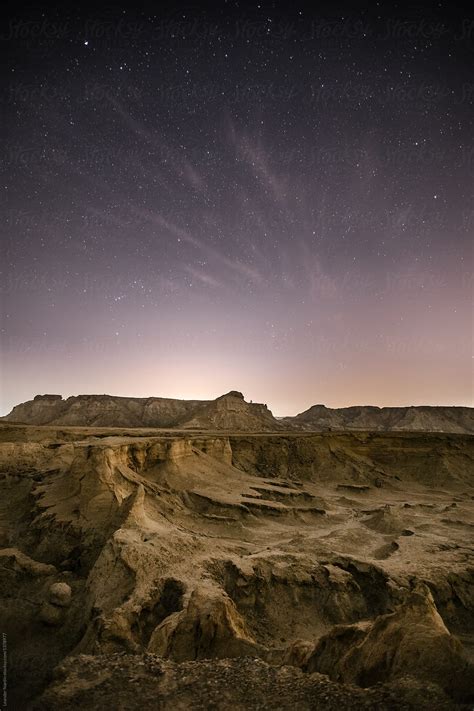 Rugged Desert Landscape At Night By Stocksy Contributor Akela