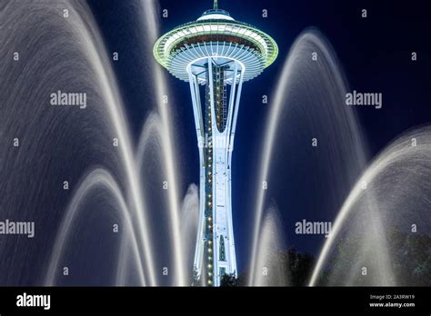 The Space Needle At Seattle Center With Fountain In Foreground At