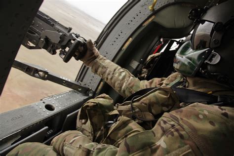Black Hawk Door Gunner An American Army Door Gunner In A B Flickr