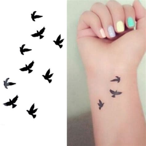 25 cute small feminine tattoos for women 2023 tiny meaningful tattoos pretty designs