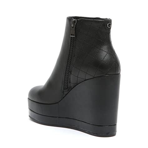 Tronchetti con zeppa neri - Guess