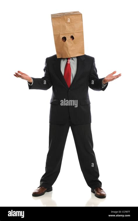 Portrait Of Businessman Wearing Paper Bag Over Head Isolated Over White
