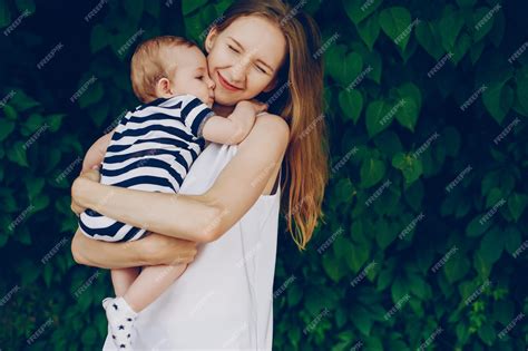 Free Photo Mom And Son Relax In The Park