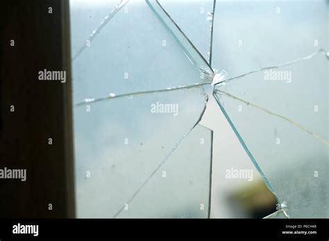 Bullet Hole In The Window Stock Photo Alamy