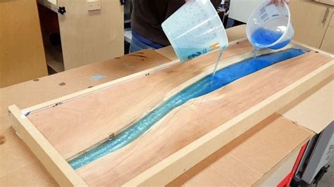 His past projects include coffee tables and storage doors. DIY Epoxy River Table with Waterfall | Epoxy wood table ...