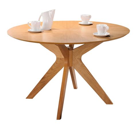 Prefer to make a statement with the silhouette of your modern dining table? Balboa Modern Round Dining Table in Oak | Eurway
