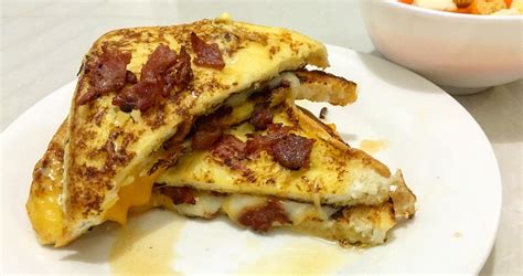 french toast grilled cheese hybrid with mozzarella sharp cheddar monterey jack bacon bits
