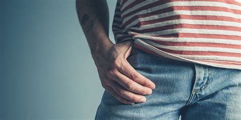 Why Men Cant Keep Their Hands Out Of Their Pants Womens Health