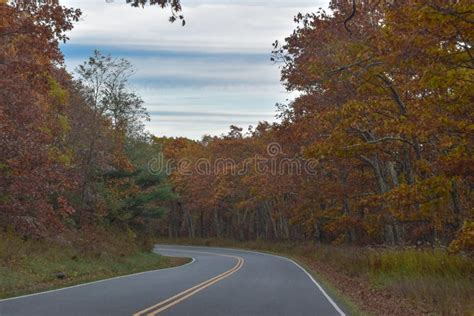 Skyline Drive A Winding Country Road Traveling Through Beautiful Fall