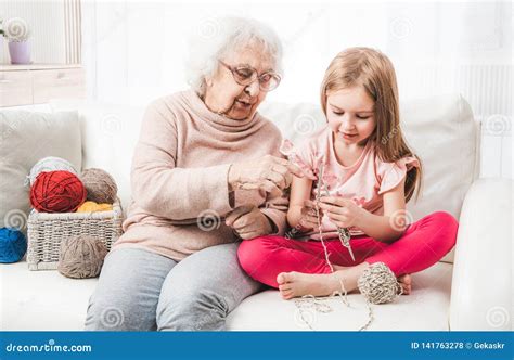 Grandmother Teach Granddaughter Knitting Stock Photo Image Of Pretty