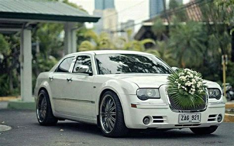 We have two awesome white bridal cars with spacious interior and elegant shiny exterior. Wedding Car Rental Philippines