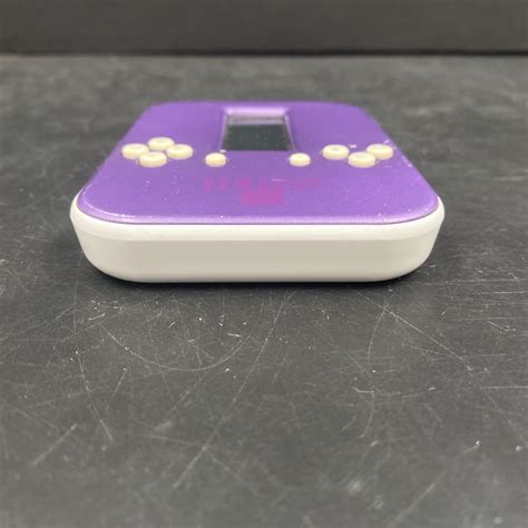 Radica Lighted Tetris Electronic Handheld Travel Game Purple Videogame