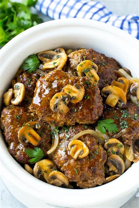 Salisbury steak is a meat patty usually made out ground beef, spices, and bread crumbs. Slow cooker salisbury steak with mushroom gravy and onions ...