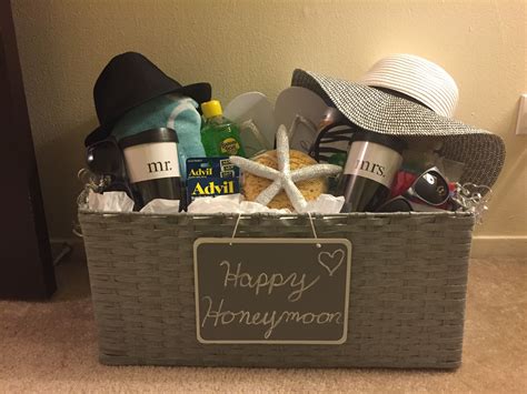 Buying a wedding gift for the happy couple can be challenging. Get all the bridemaids to make a basket to give the bride ...