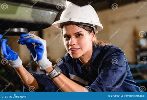 Confident Female Technician Engineer Worker Checking And Inspecting