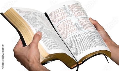 Closeup On Hands Holding An Open Bible Buy This Stock Photo And