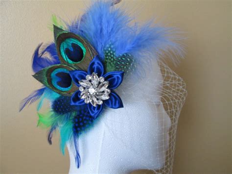 peacock wedding fascinator royal blue head piece bridal hair flower birdcage veil teal