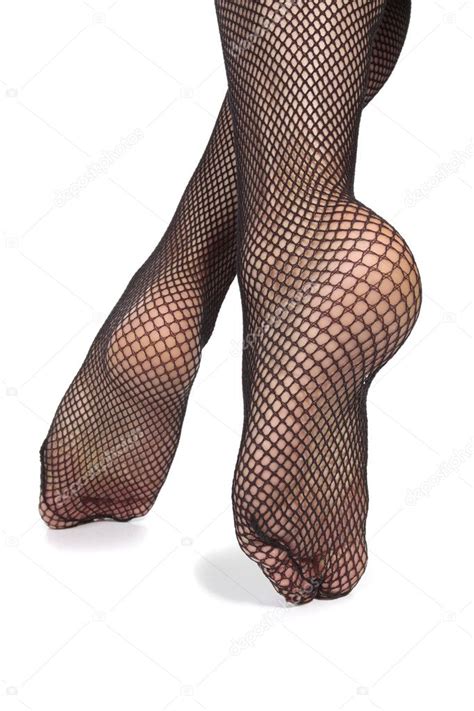 Woman Feet Wearing Fishnet Tights Over White Background Stock Photo By Strobos