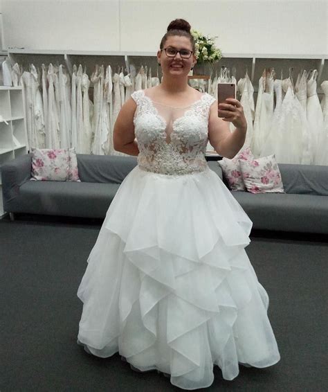 this plus size wedding dress has a beaded bodice with ornate detail we can make custom