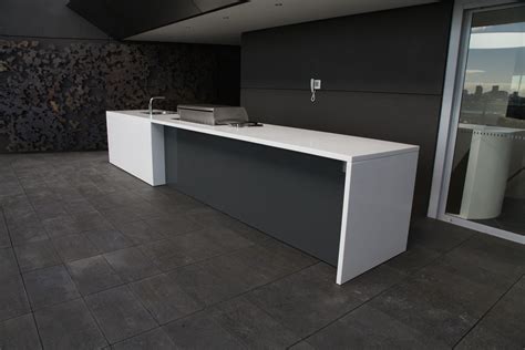 Corian Kitchen Benchtop With Waterfall Edges For A Slick Look