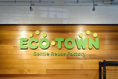 Eco Town Primary Logo Signage Clarence Lee Design Associates LLC