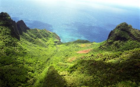Online Crop Top View Photo Of Green Mountain Near Ocean Hd Wallpaper