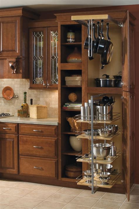 When you prefer for pots and pans to be out of sight, select a cabinet pot rack. Utility Storage Cabinet with Pantry Pull-out - Diamond