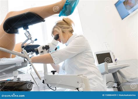 A Gynecologist Examines A Patient On A Gynecological Chair Workflow Of A Gynecologist Stock